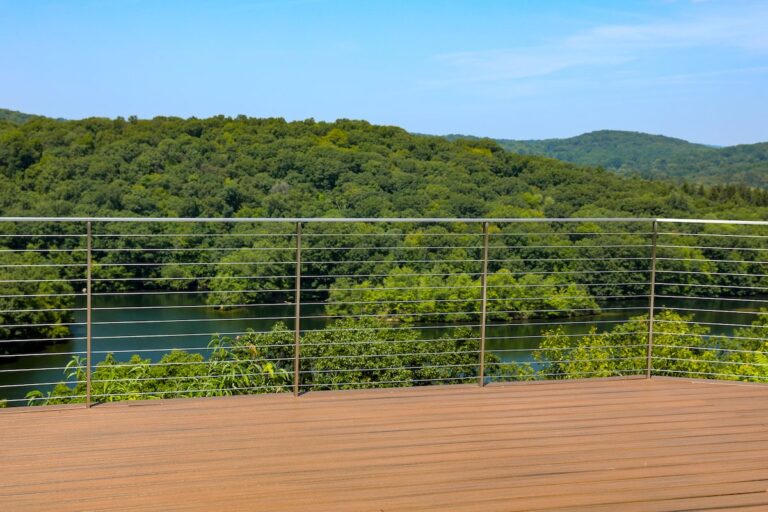 simple outdoor cable rail on deck overlooking woods