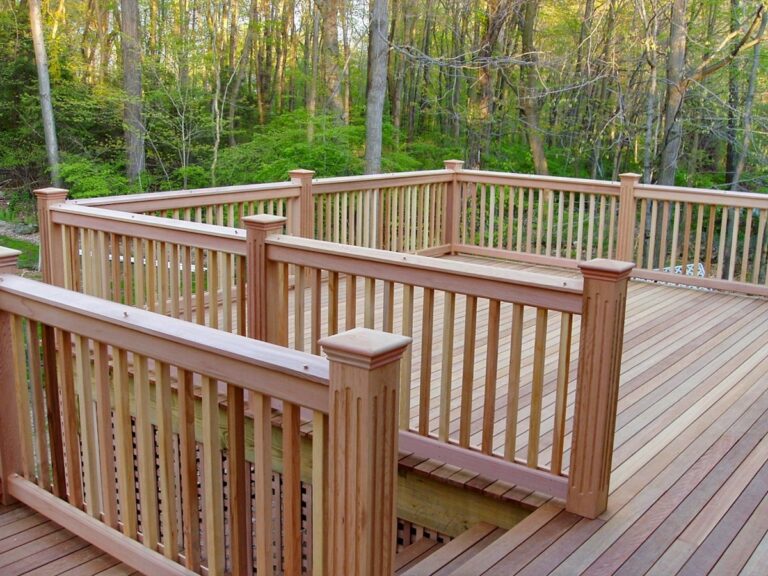 wooden backyard deck with railing