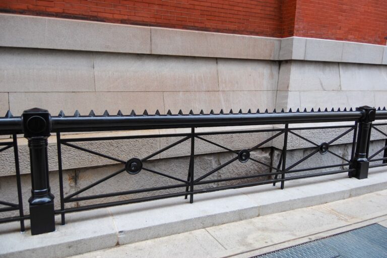 A wrought iron metal fence designed to match historical specifications.