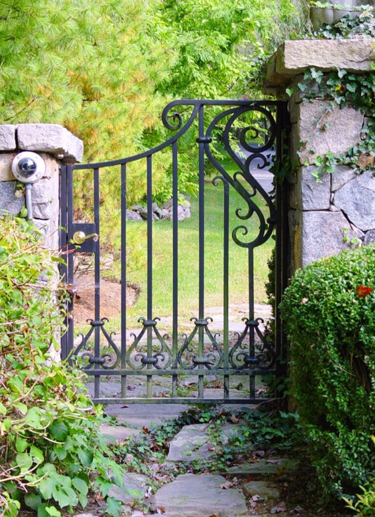 close up of swirl design on metal walk gate