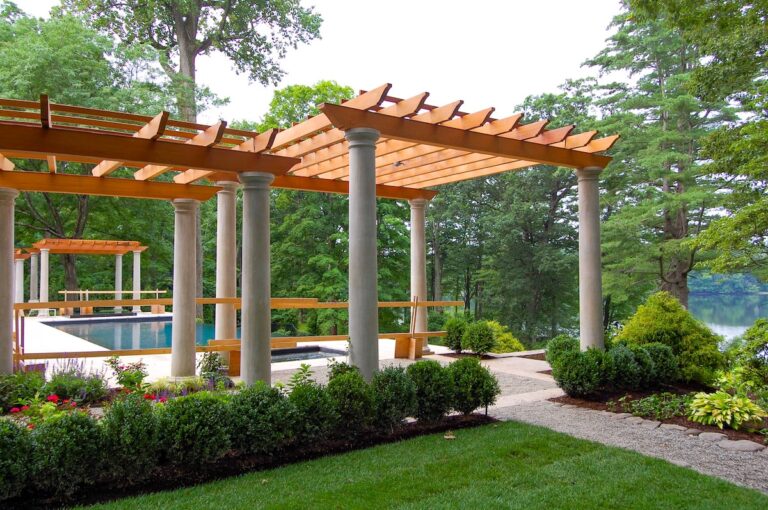 white column pergola with wood roof