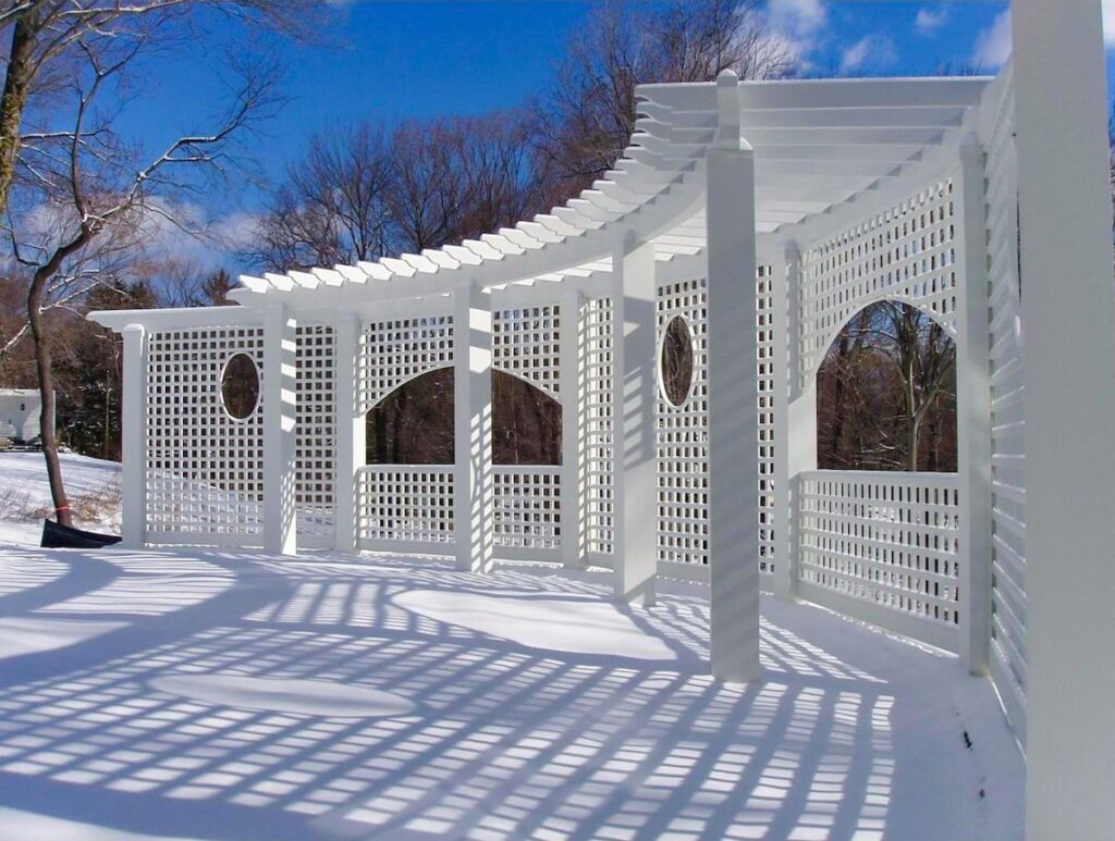 large white curved pergola