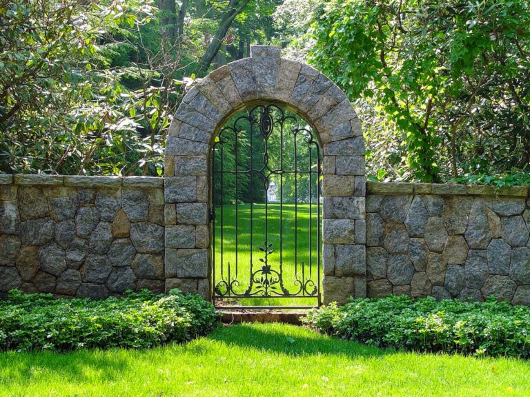 stone arch with metal walk gate