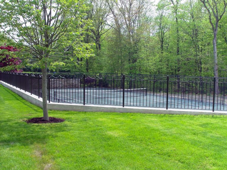 Wrought iron tennis court fence