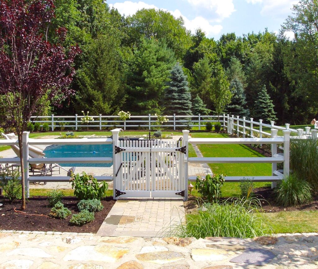 white pool fence and walk gate with caps