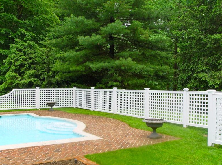 detailed white pool fencing with caps