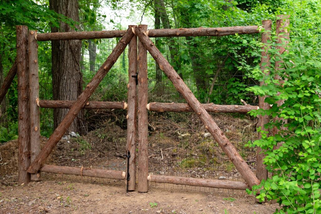 rust wood walk gate from logs