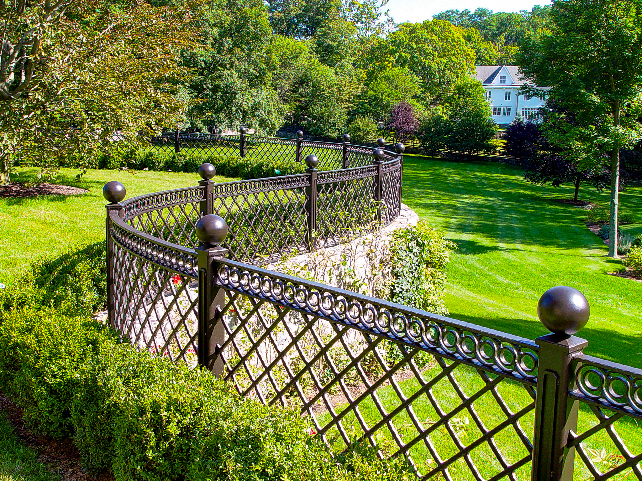 custom curved iron metal fence with wall can dramatically improve property value 