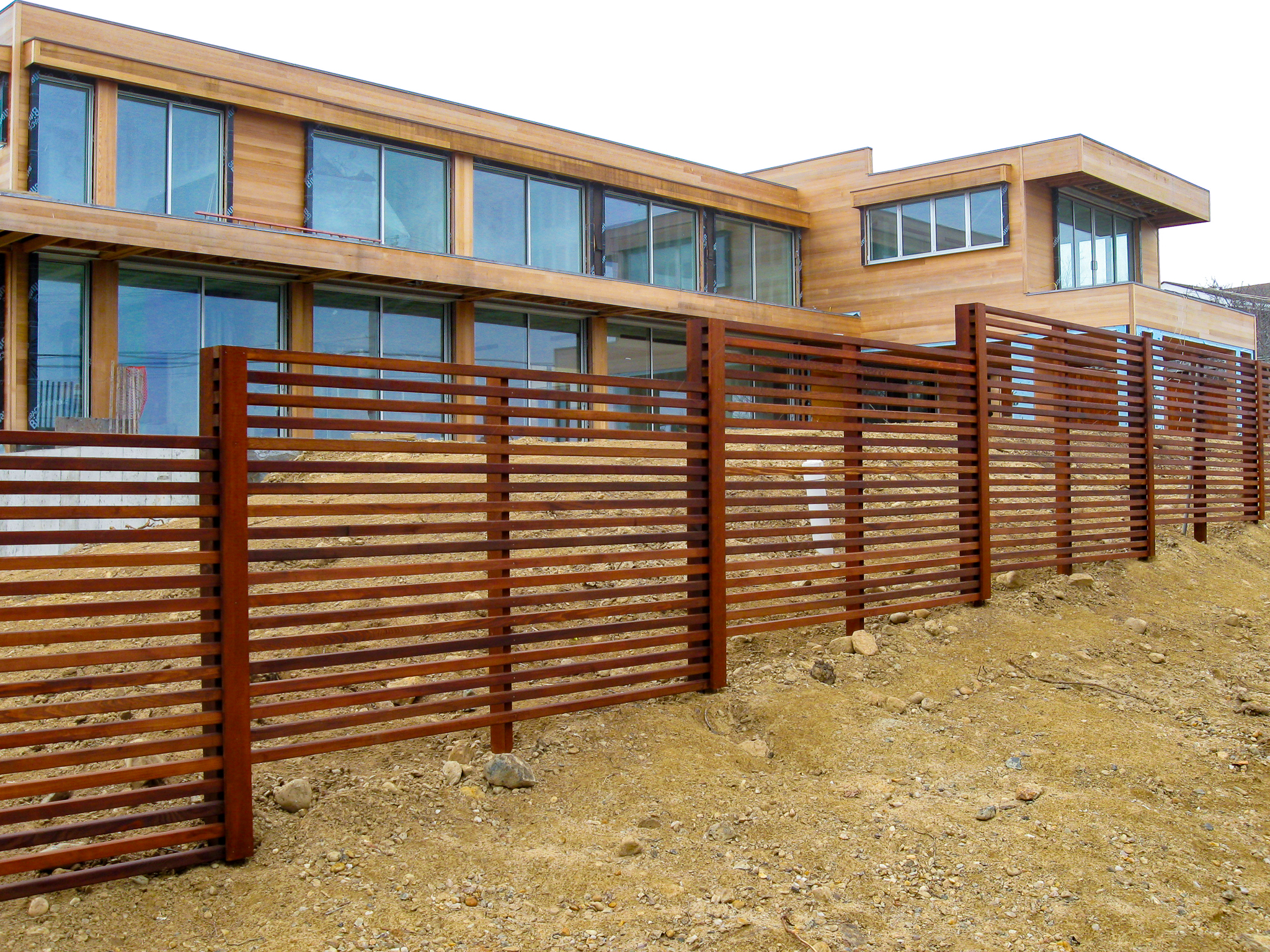 custom modern wood fencing can increase property value