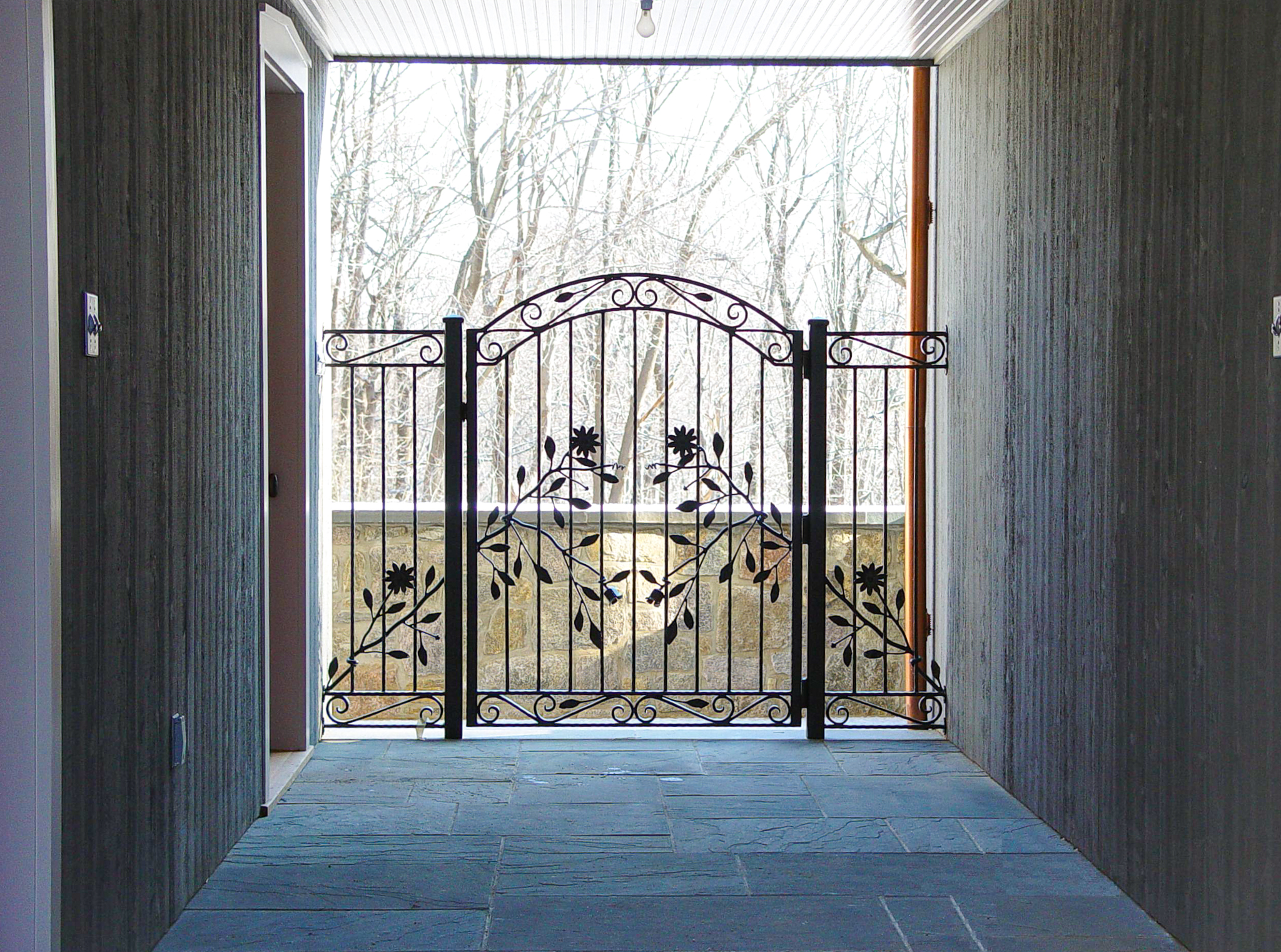 wrought iron walk gate using subtle flower design idea