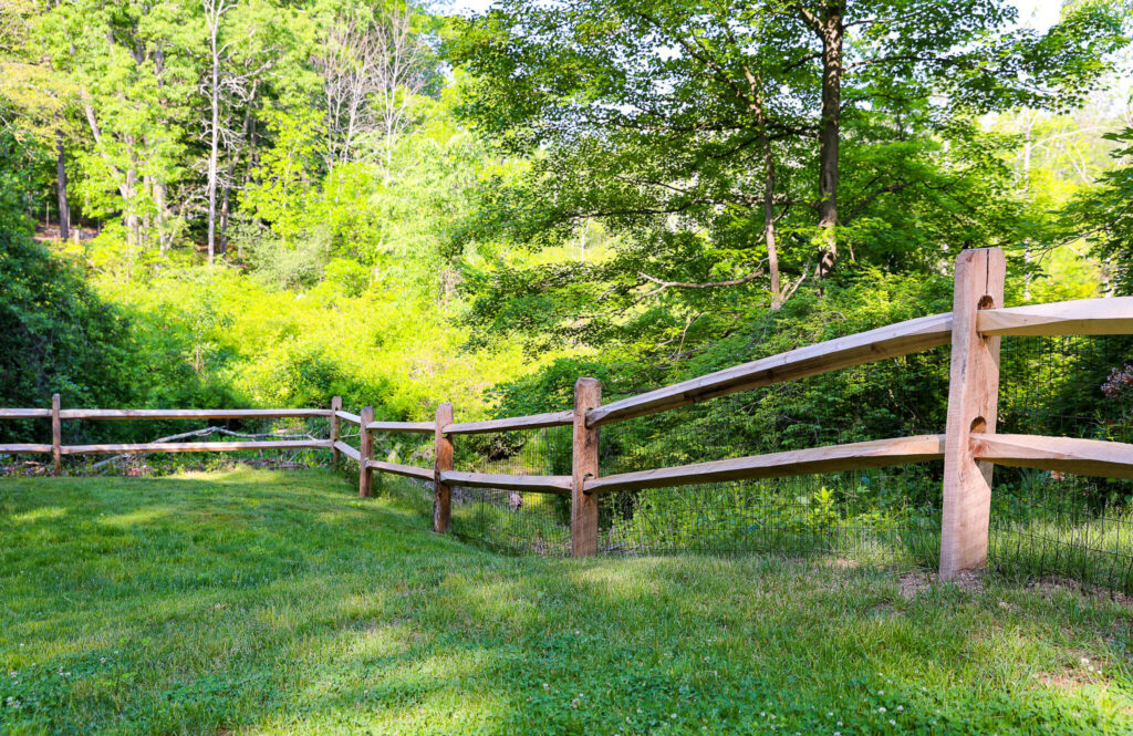 post and rail cedar fencing serving as a property border