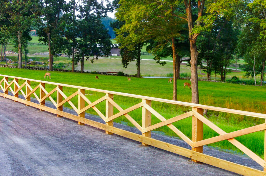 simple cedar fence as driveway border