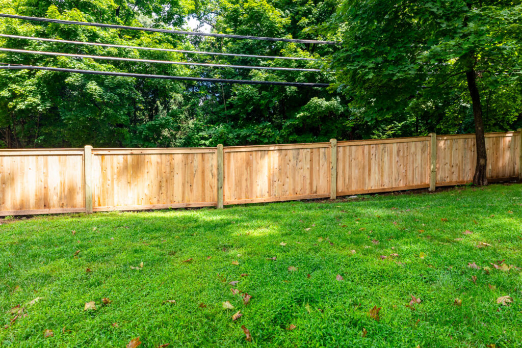 vertical privacy fence made with cedar planks