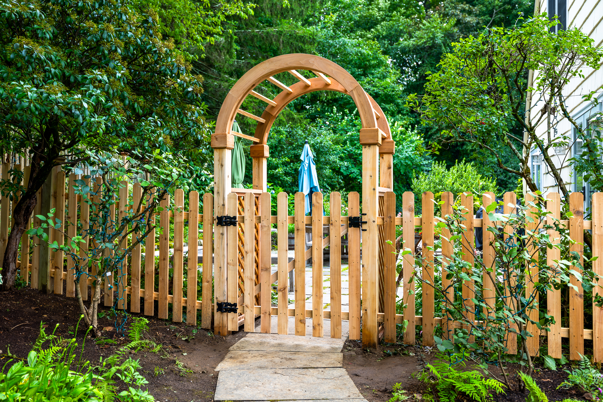 arbor walk gate and cedar fence for backyard pool area