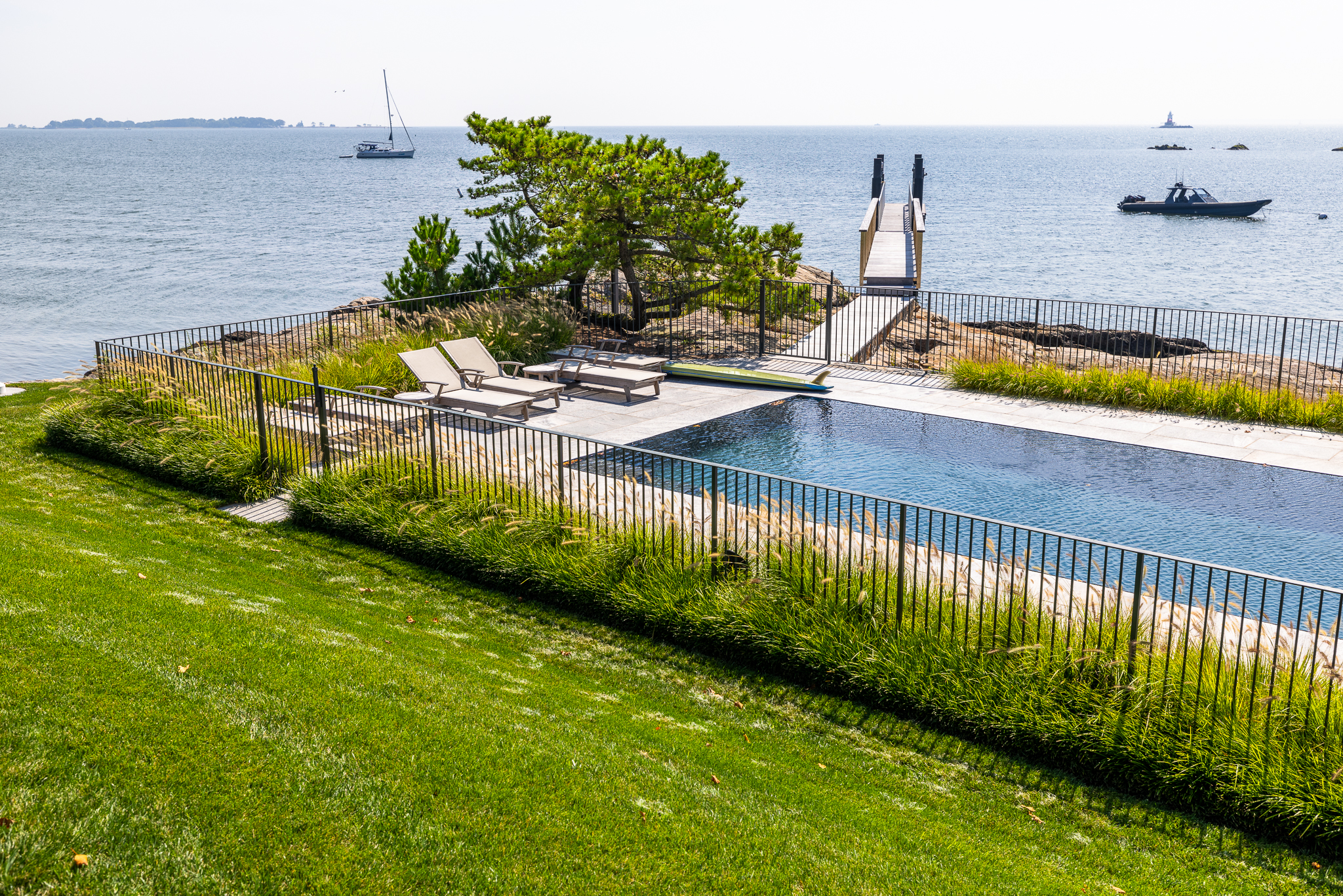 Pool border fencing near the coast