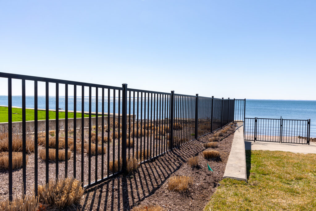 Durable, black aluminum fencing for coastal property installation