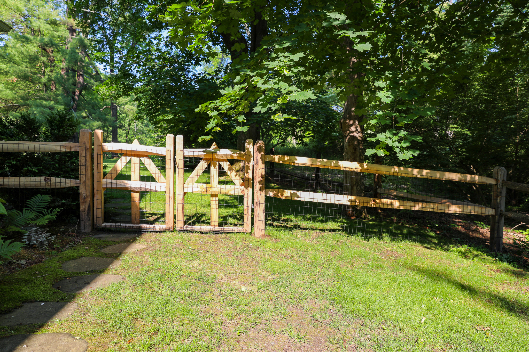 Robust post and rail fence with a dual swing gate